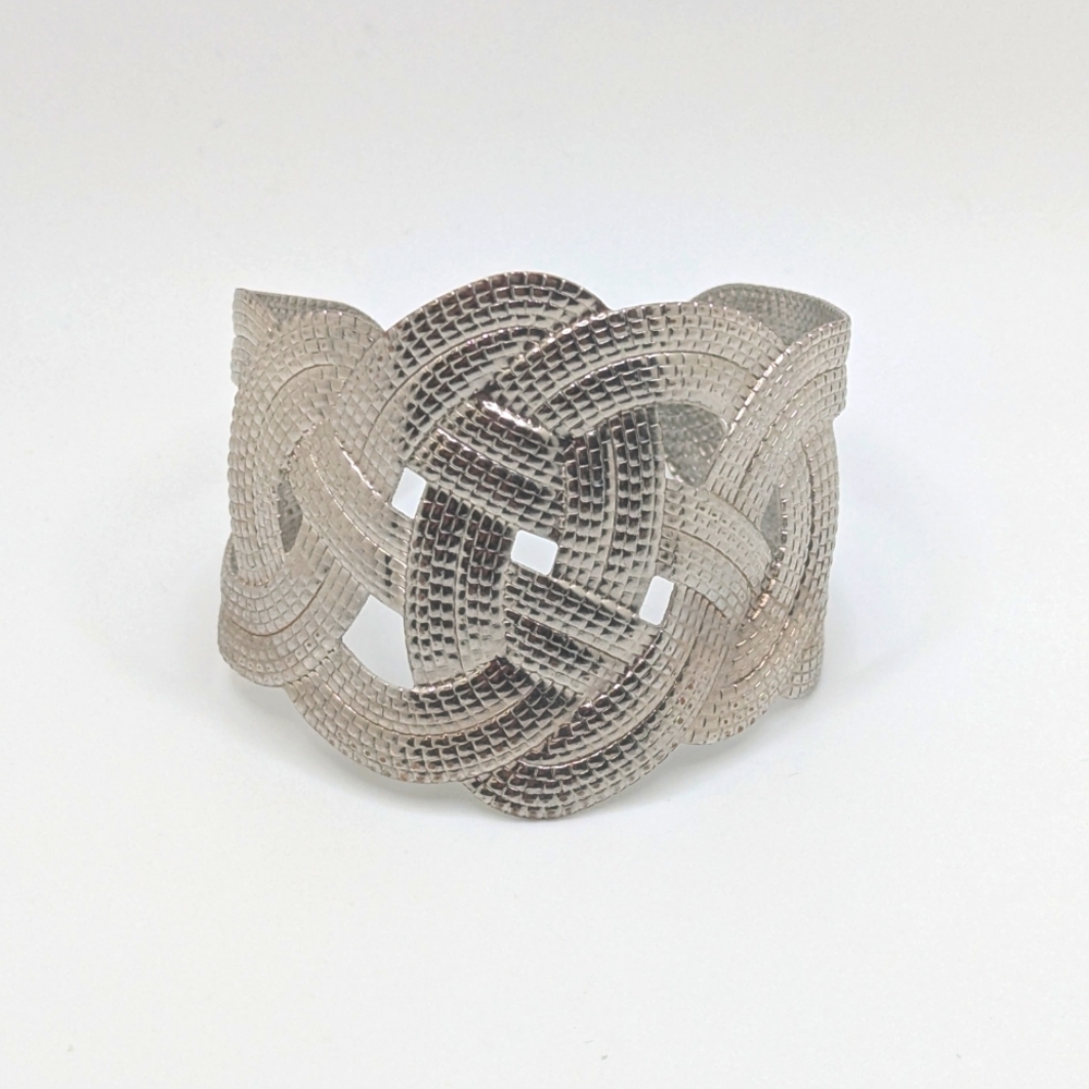 Intricate Silver Woven Bracelet with Textured Design